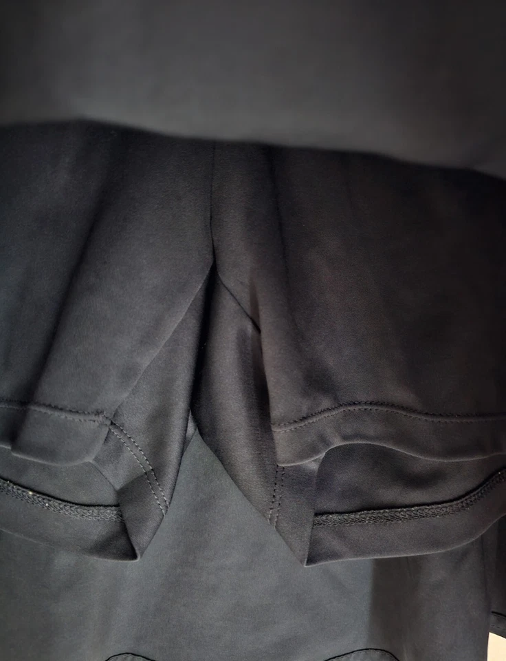 Falda corta Izod Golf para mujer talla 2 azul casi negra Foto 4 de 4