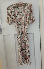 Stunning 90% pure silk occasion dress, with floral print.