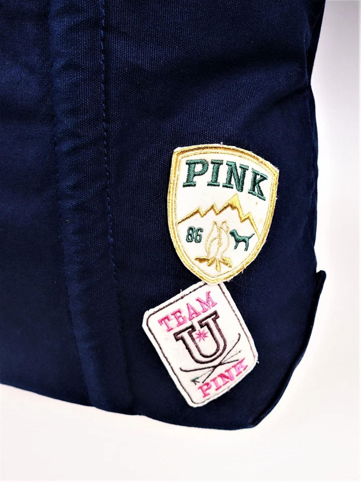 Bolso de hombro rosa Victoria’s Secret azul de lona parches Grand Escape Lodge Foto 3 de 4