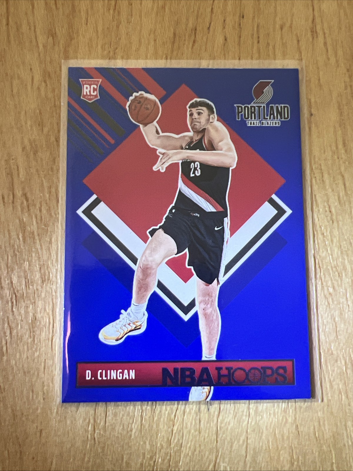 2024-25 Panini Hoops Donovan Clingan #293 Tribute Blue Rookie RC
