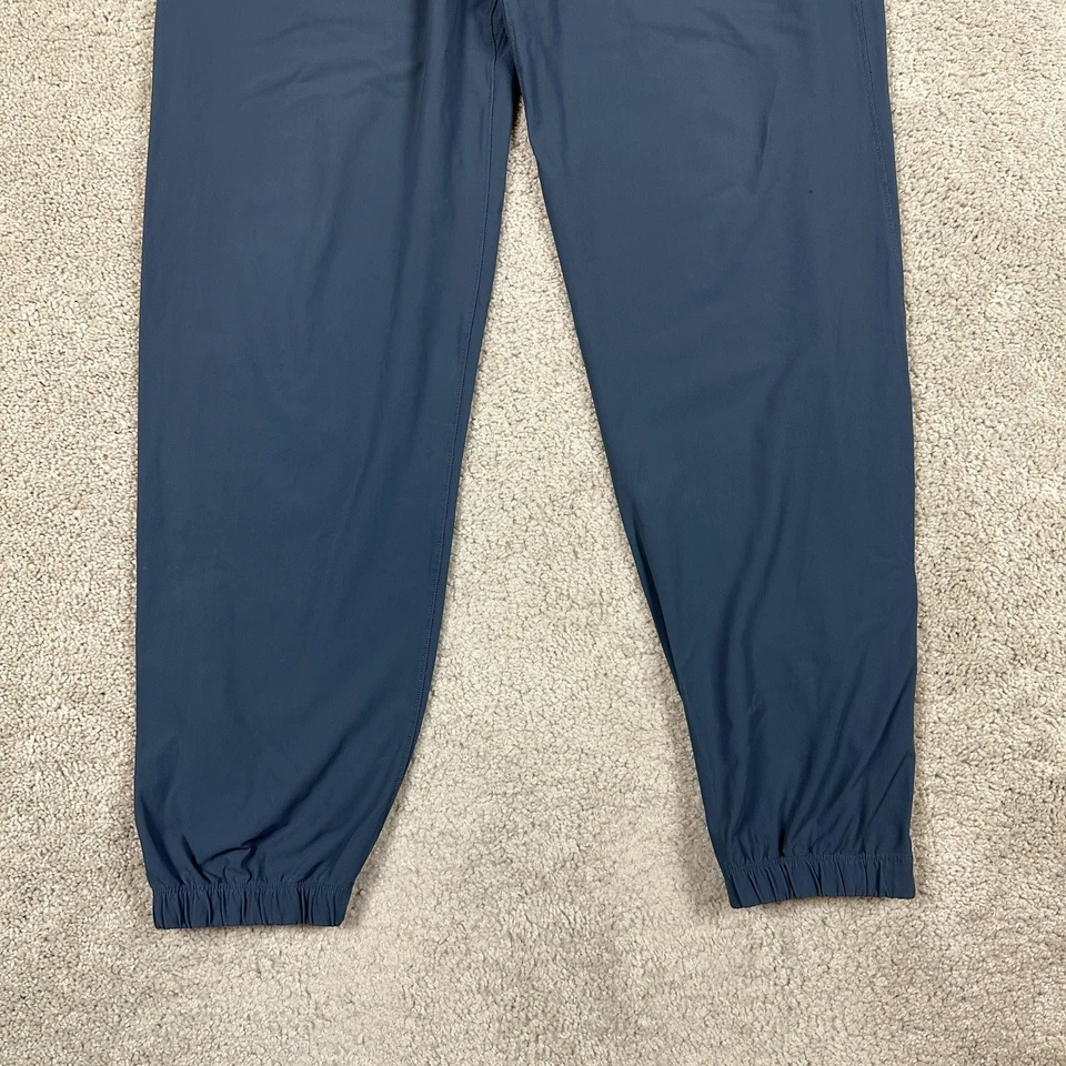 Pantalones deportivos Lululemon para hombre grandes azules grises con cremallera al tobillo Foto 3 de 4