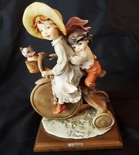 G. Armani 1982  Kids on a Tricycle  Capodimonte Figurine 7.25  L  x 11.25 H