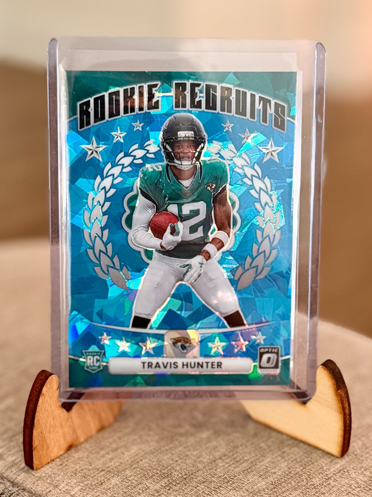 2025 Panini Optic Travis Hunter Rookie Recruits No. 3 Blue Cracked Ice /55 RC
