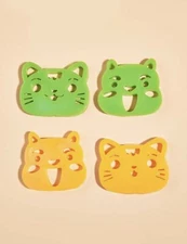 4 pc Laundry Hair Removers - Random Cartoon Faces with 4 Mini Laundry Balls