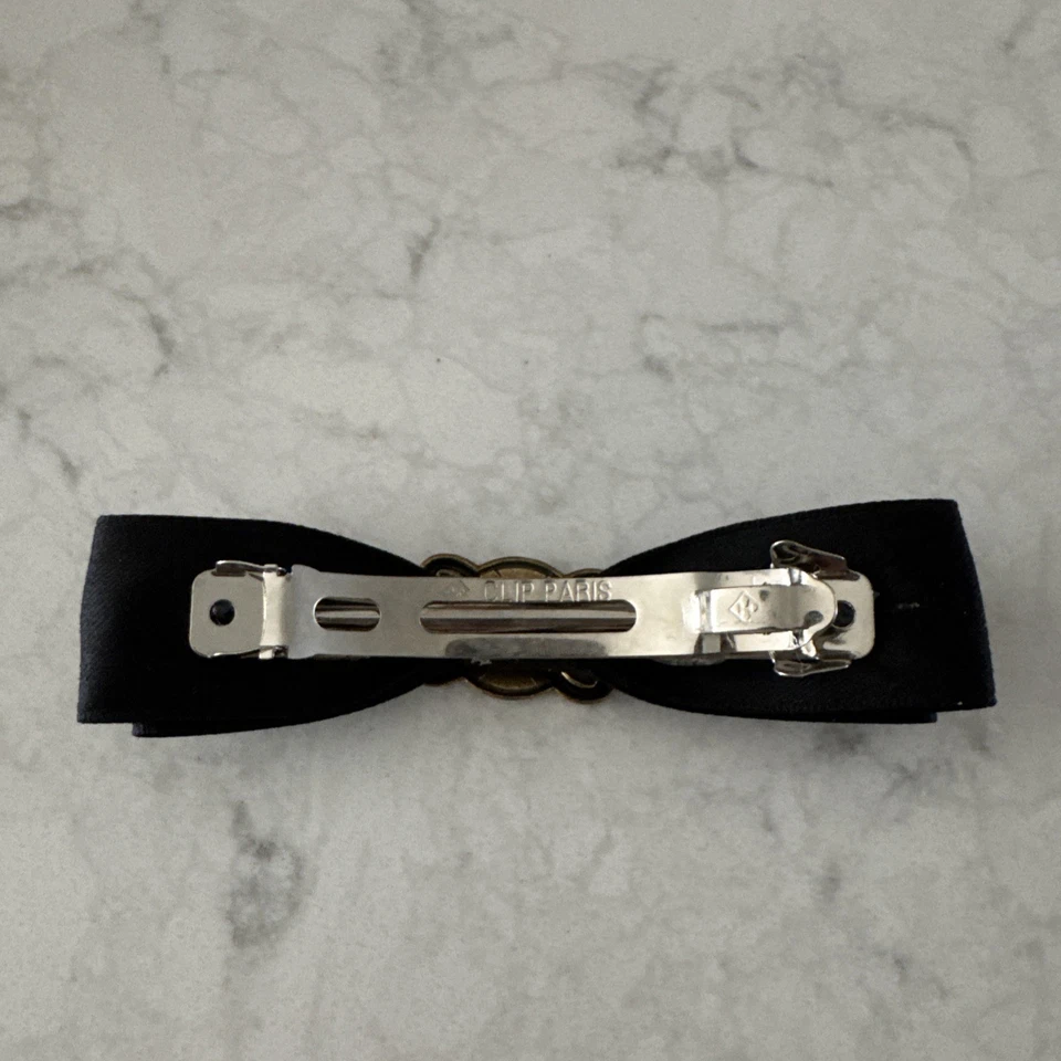 Clip de pelo Celine cinta negra/dorada Foto 3 de 3