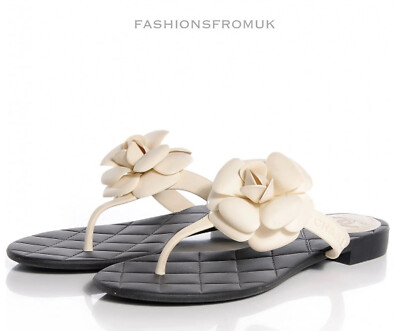 CHANEL WHITE CAMELLIA FLOWER BLACK QUILTED JELLY FLIP FLOP SANDALS