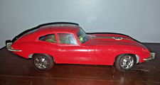 Vintage Bandai Japan Battery operated Jaguar Plastic Body Tin Chassis toy Car