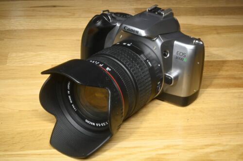 Canon EOS 3000V SLR + Sigma 28-200 mm 3.5-5.6 AF - Afbeelding 1 van 11