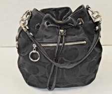 Purse Coach Poppy Drawstring Cinch Bag All Over Logo Black Canvas Sheen