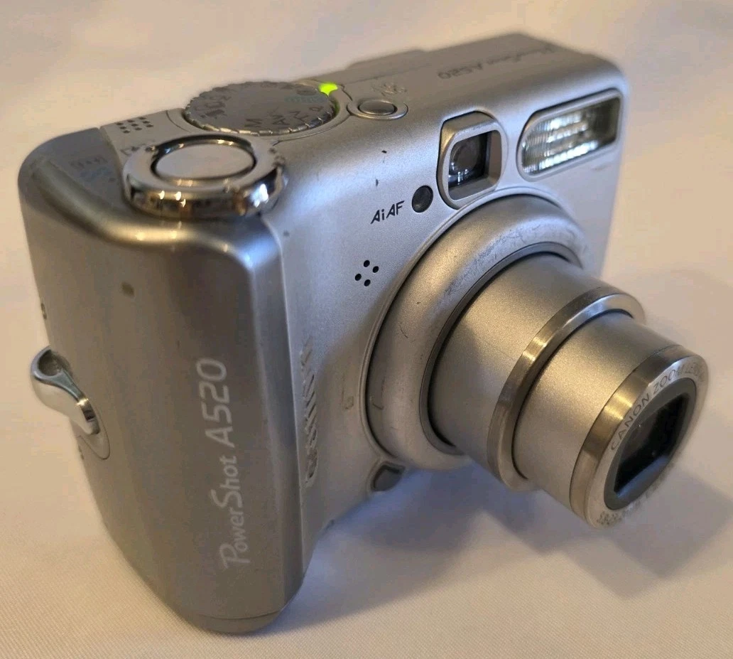 Preços baixos em Câmeras digitais Canon Powershot A520 com