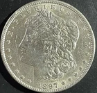 1897 $1 Morgan Silver Dollar. 90% Silver.  ￼#1872