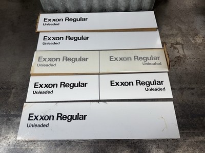 Group Of NOS Exxon Regular Gas Oil Pump Panel Signs