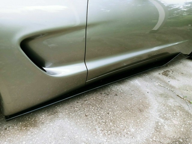 Glossy Black Side Skirts & Rocker Panel Extensions For 1997-2004 Chevy Corvette C5 - ZR1 Style, Includes Mud Flaps