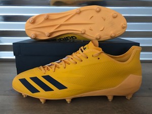 blue and gold adidas cleats