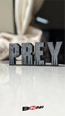 PREY sign display with collectibles PREDATOR HULU Beena Studio