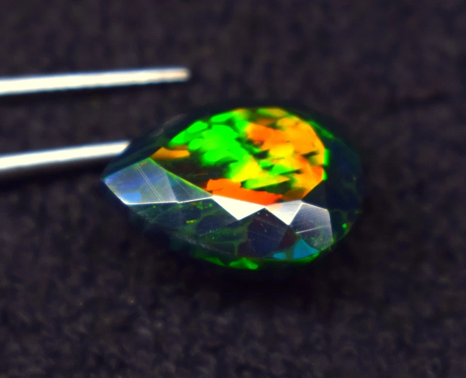 7.2 CT Fire Black Smoked Ethiopian Opal Pear Faceted Gemstone 16.4X13.1X9.4 mm - Image 2 of 4