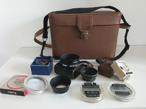 Vintage camera case with accessories