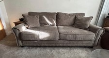 Beige Solid Fabric Upholstered Sofa with Rolled Arms & Nailhead Trim