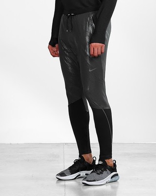 Nike Swift Shield Pantalones de correr para hombre - black/reflective black  CU7857-010