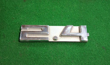 Nice used original 2.4 badge for Porsche 911  1972-73 engine lid grille fitment
