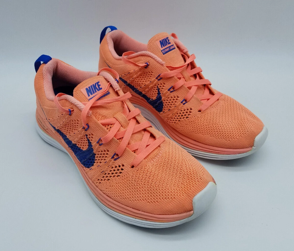 Nike women's shoes orange hotsell and blue