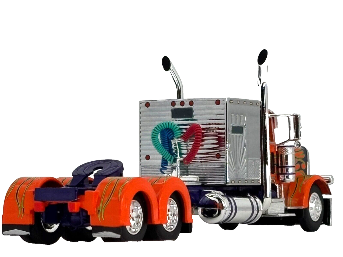 1/64 DCP ORANGE/PURPLE/GREEN PETERBILT 389 W/ 60