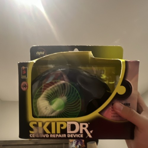 Skip Dr CD/DVD Repair Device removes scratches very slightly used box beat up 