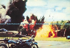 D149643 A Petrol Bowser Receives a Direct Hit During a Bombing Attack on One of