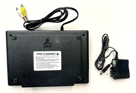 Atari Flashback 4 Classic Game Console only with charger and Manual.