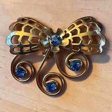 Gold Tone Bow Brooch Pin Blue Crystal Rhinestones Prong Set Round Stones