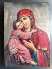An Old wooden icon of the Vladimir Mother of God. Combined shipping