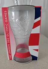 London 2012   Olympics Coca Cola Glass With Red Wrist Band 