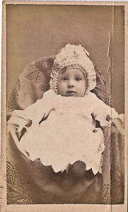 1870-1879-CDV-Baby-with-Elaborate-Ruffled-Ribbon-Bonnet-Edmore-MI-Howorth