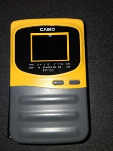 Hand-held Casio TV 100B Vintage-1993. Yellow/Grey Color Scheme...