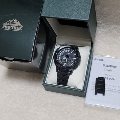 Mint condition CASIO Pro Trek watch with accessories.