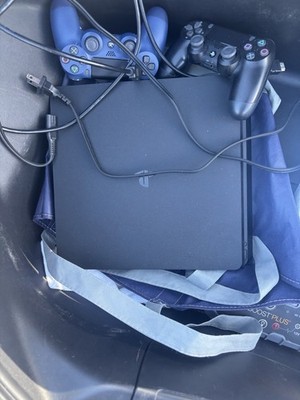 PS4 slim with 1tb and two controllers  