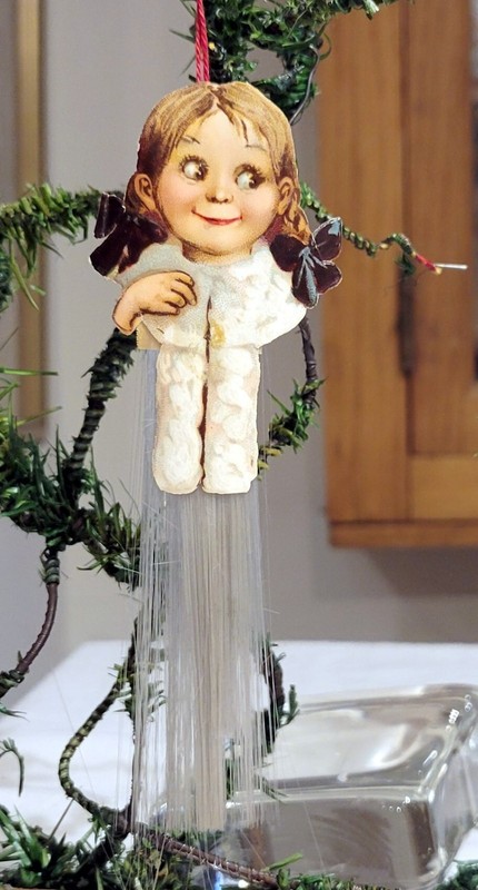 Smiling Girl with Pig-tails. Smaller 1890s Paper & Spun Glass German Ornament.