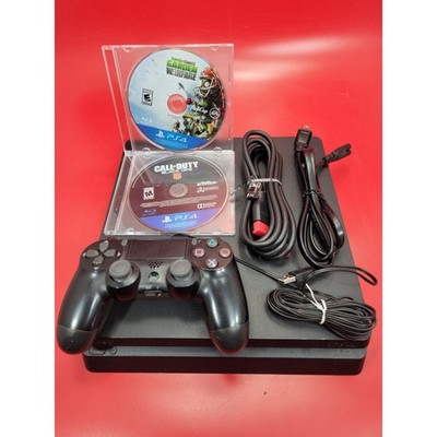 Sony PlayStation 4 Slim 500GB Console W/ 1 Controllers/Charger Cords & 2 Games