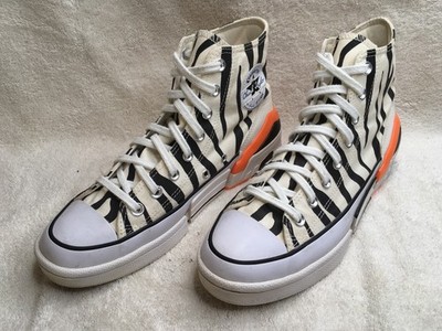 Converse women s Chuck Taylor All Star  Sunblocked zebra print sneakers size 10 