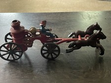 vintage cast iron horse drawn fire wagon. Taiwan.
