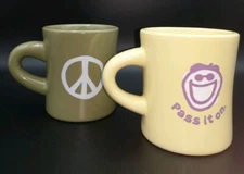 2 LIFE IS GOOD Coffee Cups with Peace Sign Green & Pass it On Yellow Mugs Fun
