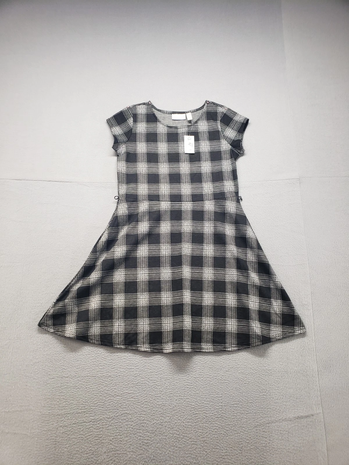 The Childrens Place Girl Dress 14 Black Plaid Fit & Flare Round Neck Summer Wear
Opens in a new wind