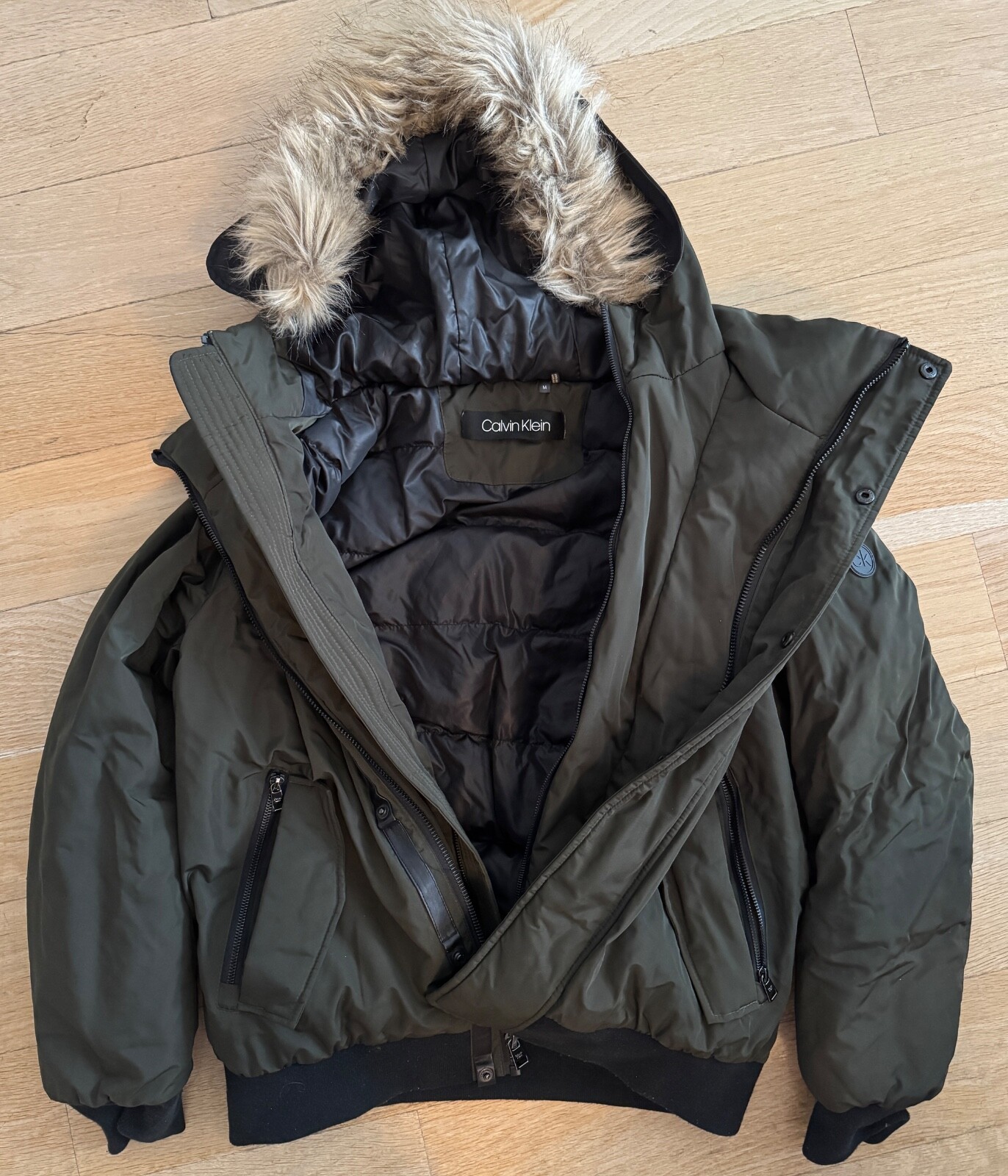 Calvin Klein waterproof hooded winter jacket for men in olive green with fur trim