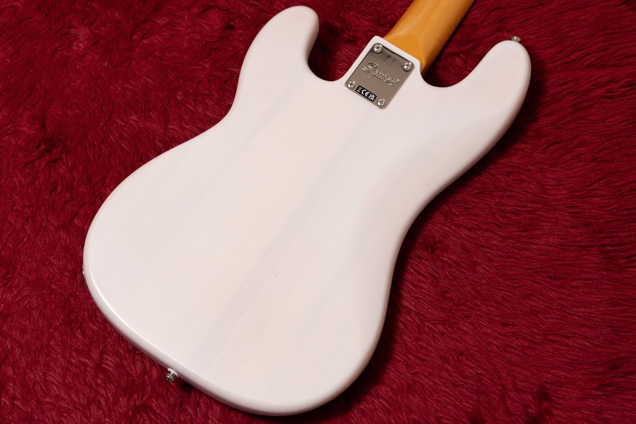 White Squier by Fender Classic Vibe 50s precision bass with silver hardware and subtle “blonde” finish on back.