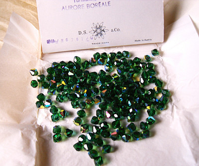 Swarovski  KRISTALLSCHLIFFPERLEN, ''Green Turmaline'' AB - 8 mm Doppelkegel,140 St