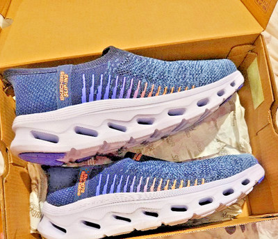 sketcher slip ons never worn comes with box and tote bag