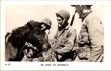 RPPC 3 US Marines Feed Grass to Pony Be Kind to Animals