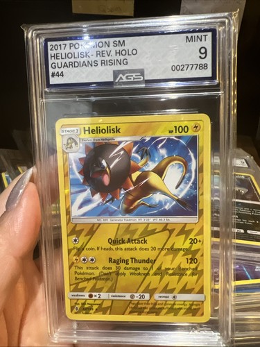 2017 Heliolisk 44/145 Sm-Guardians Rising Reverse Holo Graded AGS 9 Mint - Picture 2 of 3