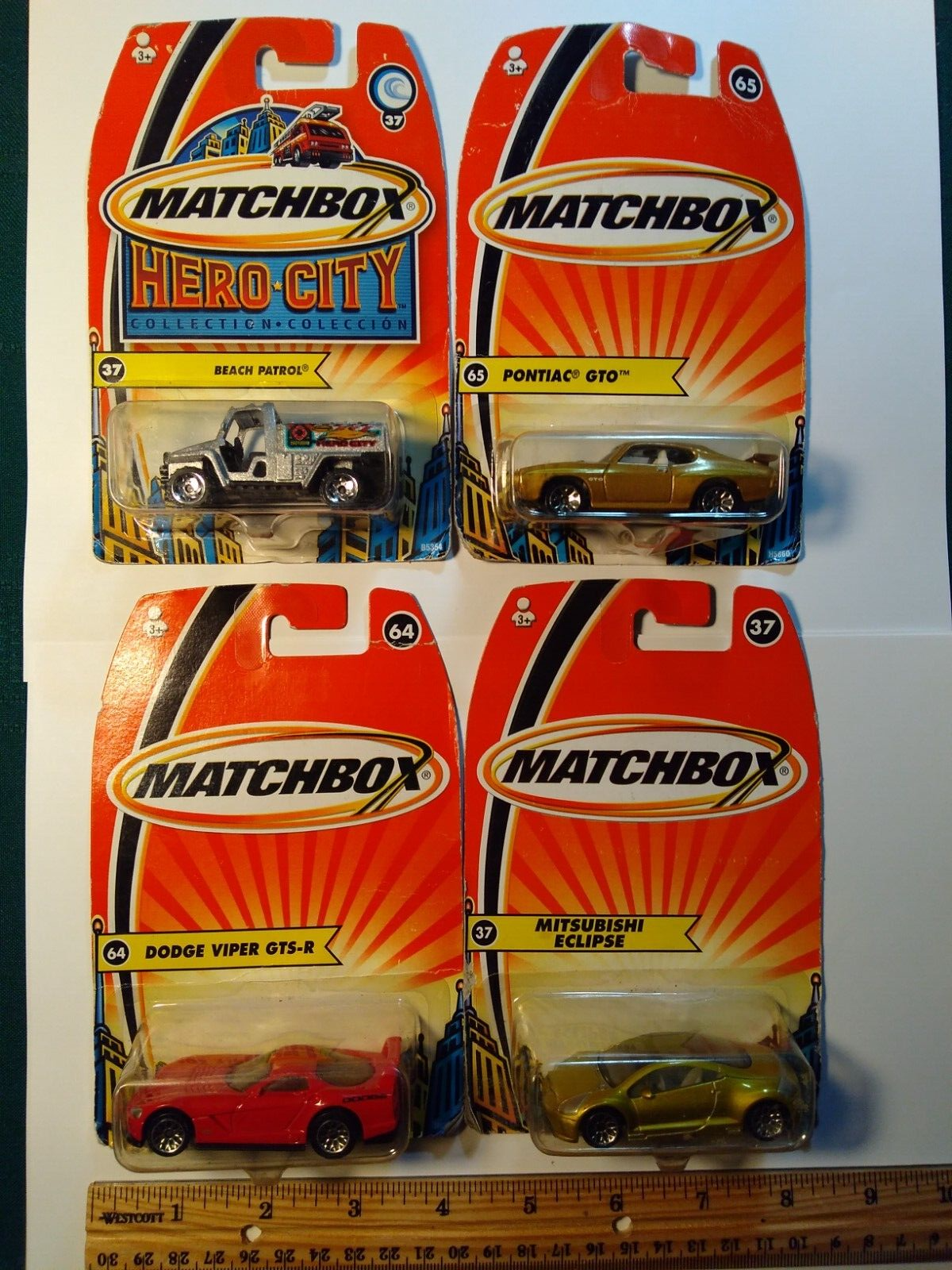 4 Matchbox Vehicles- New in package.