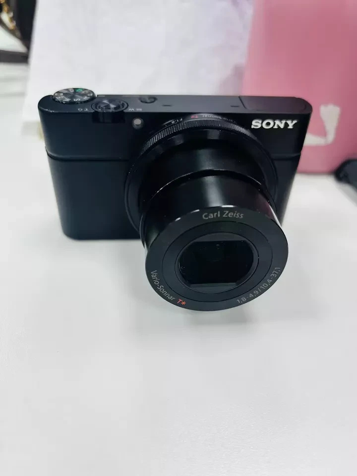 Sony Cyber-shot DSC-RX100 20.2MP Digital Camera - Black Includes